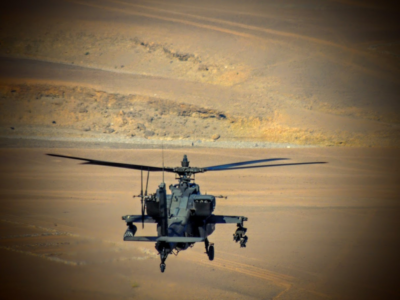 Illustration for article titled One Of Our Readers Is Flying Apaches In Afghanistan And Really Knows How To Use A Camera